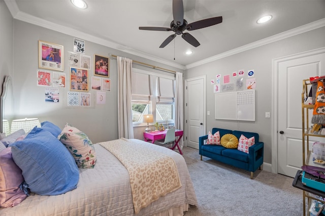 bedroom with crown molding, light colored carpet, and ceiling fan