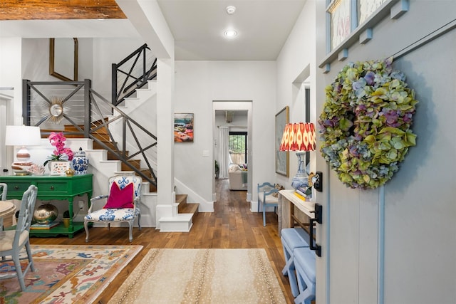 entryway with hardwood / wood-style floors