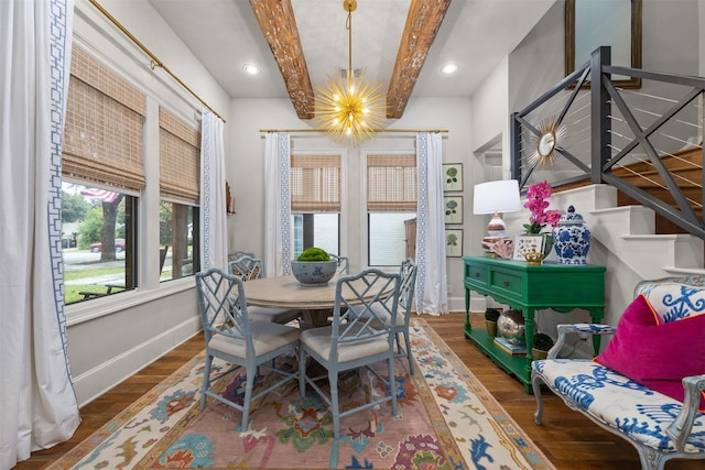 dining room featuring wood-type flooring, beam ceiling, and a chandelier