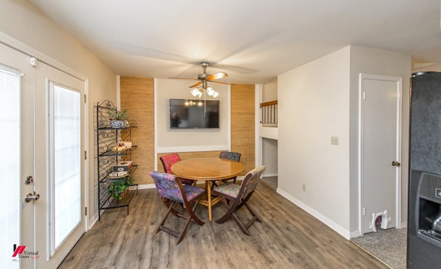 dining room featuring hardwood / wood-style flooring and ceiling fan