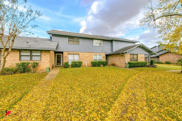 view of front of property with a front lawn