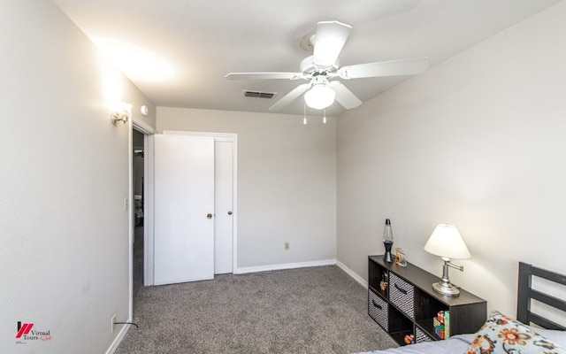 bedroom with carpet flooring, a closet, and ceiling fan