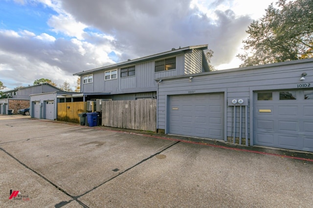 exterior space with a garage