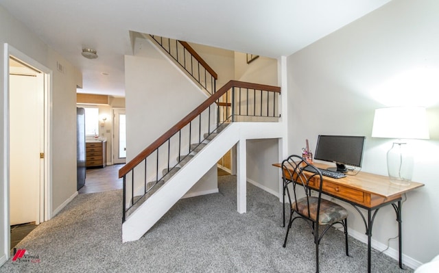 view of carpeted home office