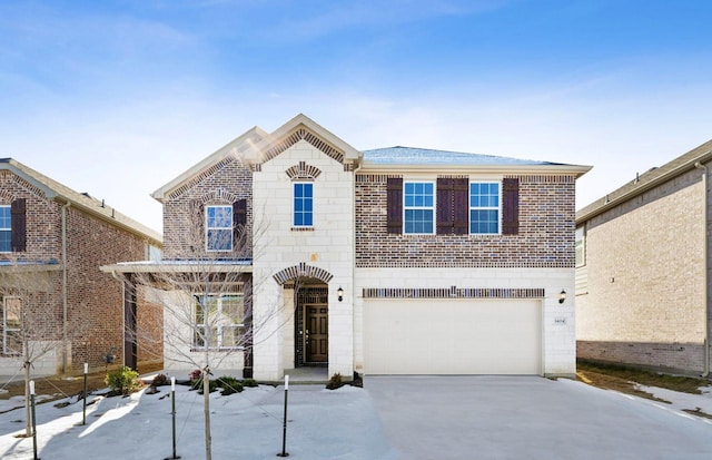 view of front property with a garage