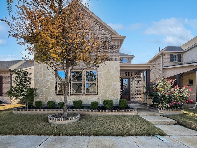 view of front of property with a front lawn