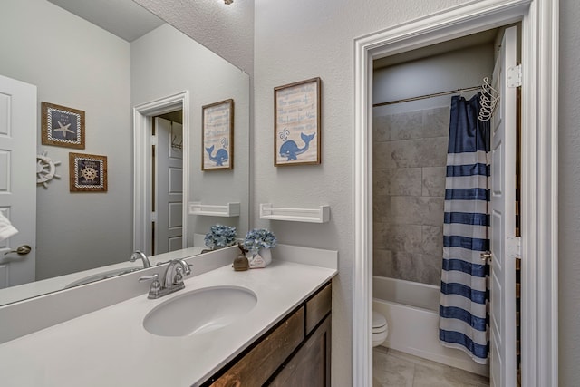 full bathroom with shower / bath combo, vanity, toilet, and tile patterned floors