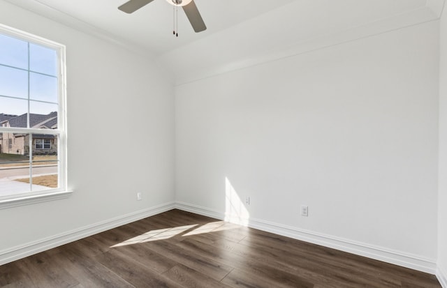 unfurnished room with ceiling fan, dark hardwood / wood-style flooring, and lofted ceiling