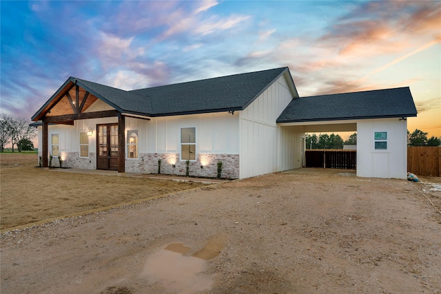 view of front of home with a carport