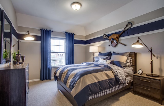 bedroom with light colored carpet