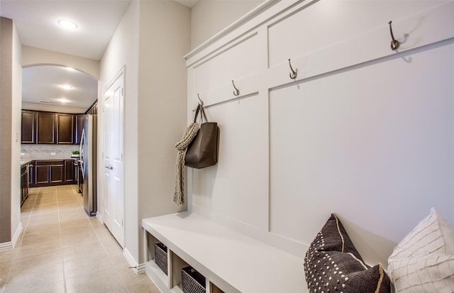 mudroom with light tile patterned floors