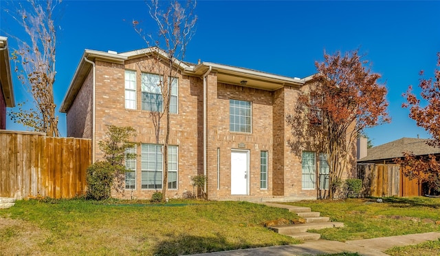 view of front of property with a front lawn