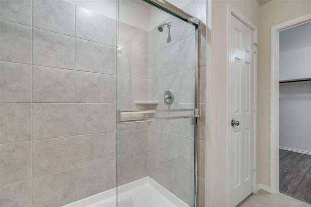 bathroom with an enclosed shower