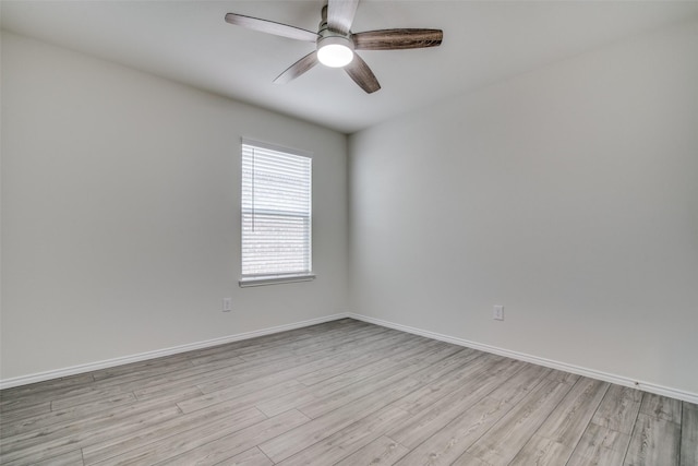 spare room with ceiling fan and light hardwood / wood-style flooring