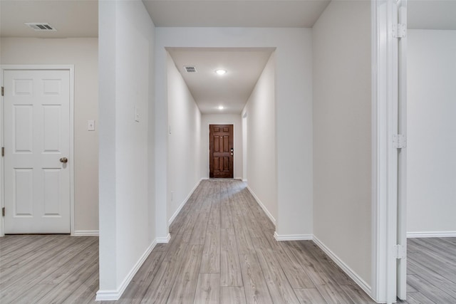 hallway featuring light wood-type flooring