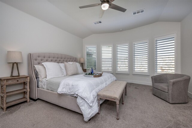 carpeted bedroom with lofted ceiling and ceiling fan