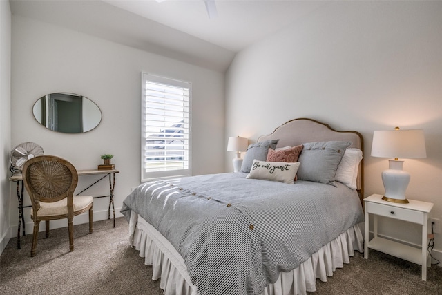 carpeted bedroom featuring vaulted ceiling