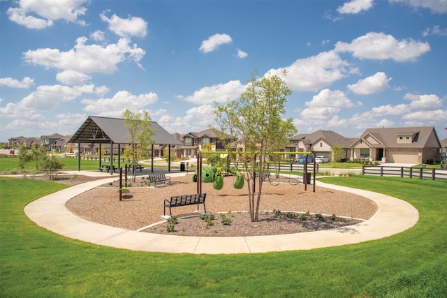 view of community featuring a gazebo, a yard, and a playground