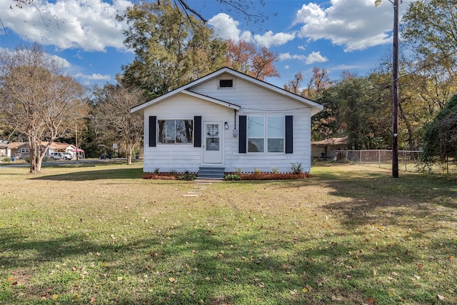 view of front of house with a front lawn