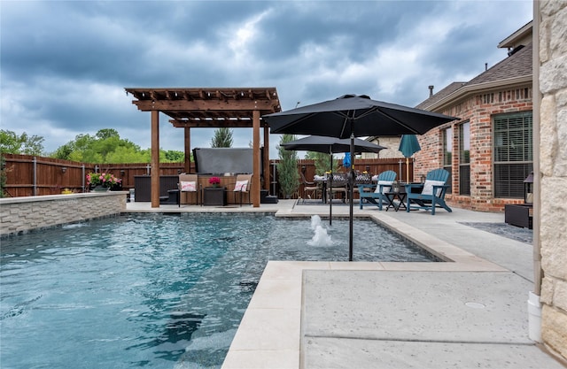 view of swimming pool with pool water feature, a patio area, a pergola, and outdoor lounge area