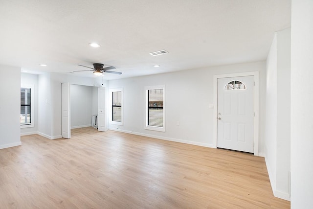 interior space featuring ceiling fan and light hardwood / wood-style floors