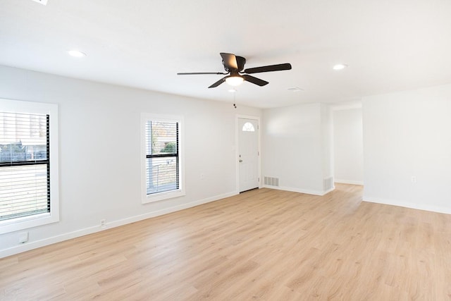 interior space featuring ceiling fan and light hardwood / wood-style floors