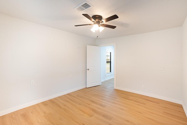 unfurnished room featuring light hardwood / wood-style flooring and ceiling fan