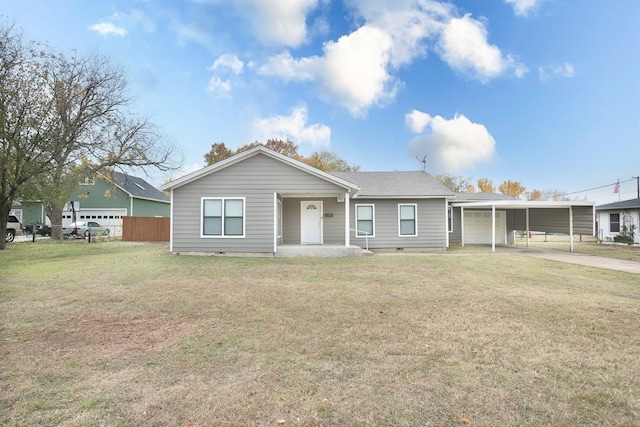 ranch-style house featuring a carport and a front yard