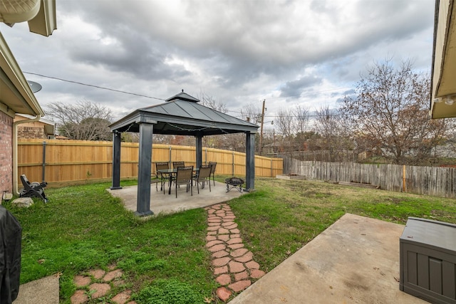 view of yard featuring a gazebo and a patio area