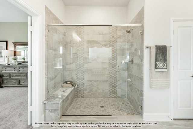 bathroom featuring an enclosed shower