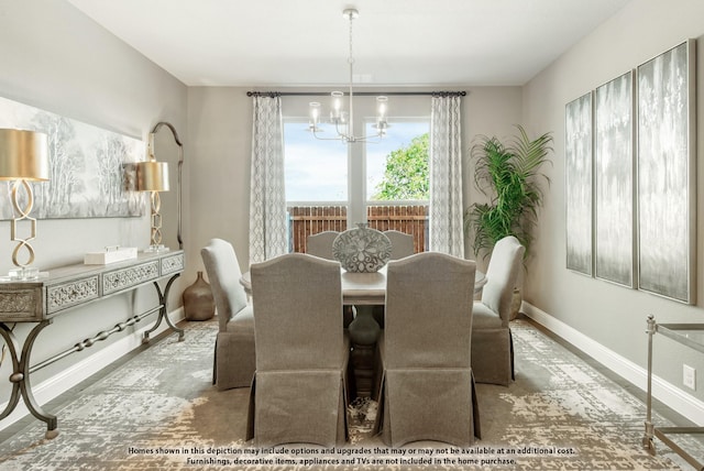 dining space featuring an inviting chandelier