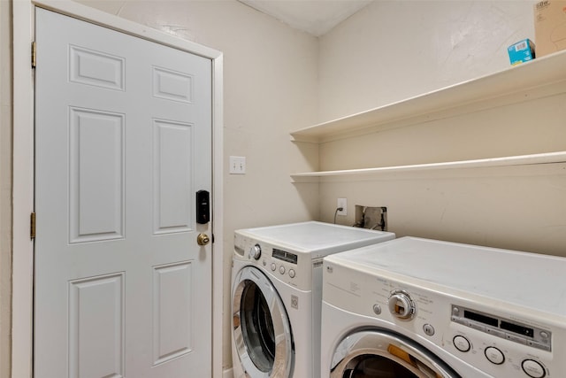 laundry area with washer and clothes dryer