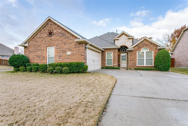 front of property with a garage