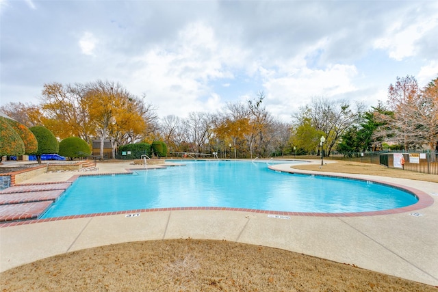 view of swimming pool featuring a patio