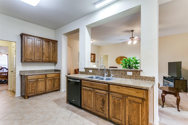 kitchen featuring ceiling fan, dishwasher, sink, kitchen peninsula, and light tile patterned floors