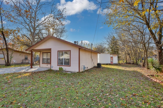 exterior space with a shed and a yard