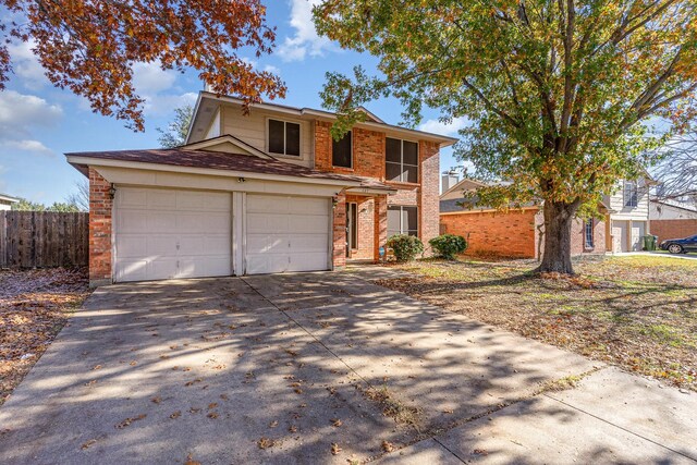 front of property featuring a garage