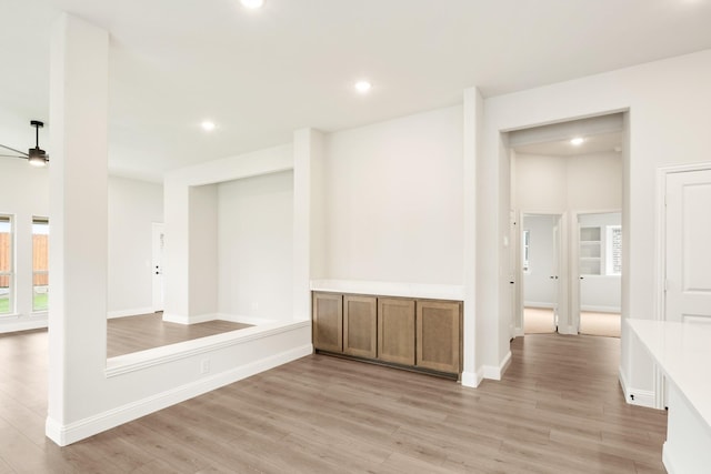 mudroom with recessed lighting, a ceiling fan, light wood finished floors, and baseboards