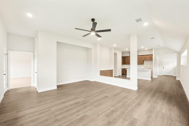 unfurnished living room with recessed lighting, ceiling fan, baseboards, and light wood finished floors