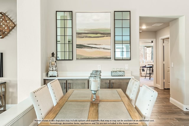 dining area featuring wood-type flooring