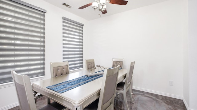 dining space featuring ceiling fan