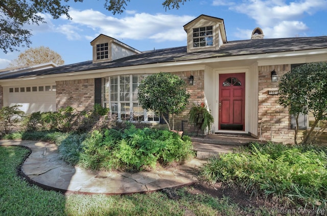 entrance to property with a garage