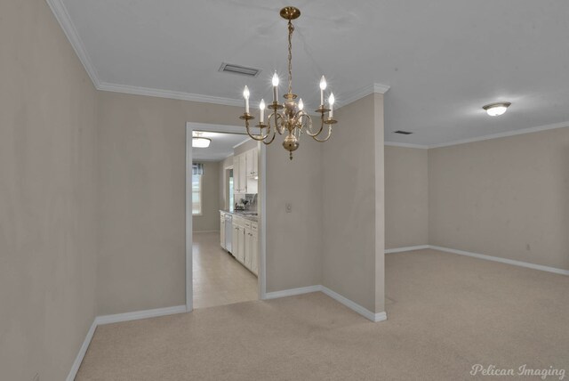 empty room featuring sink, ornamental molding, light colored carpet, and a notable chandelier