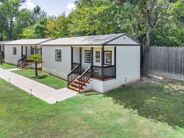 view of front of home with a front yard