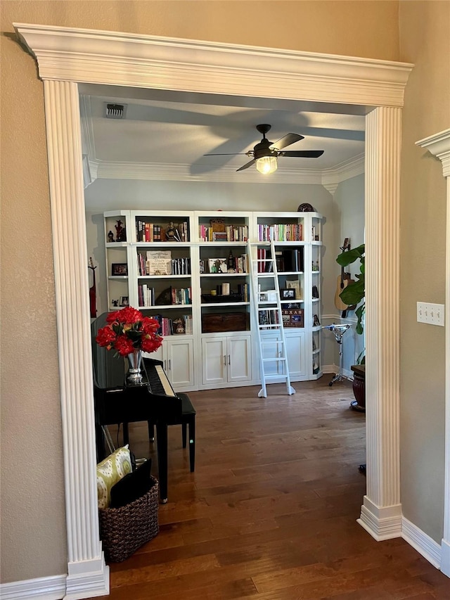 hallway featuring dark hardwood / wood-style flooring and ornamental molding