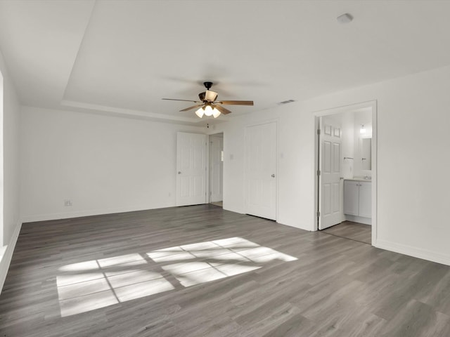 interior space featuring hardwood / wood-style floors and ceiling fan