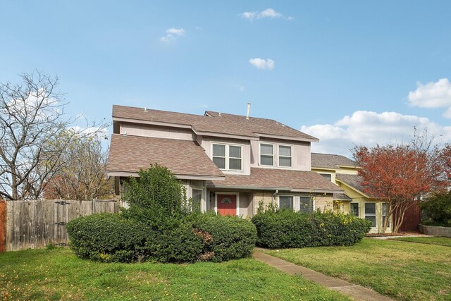 view of front of property with a front lawn