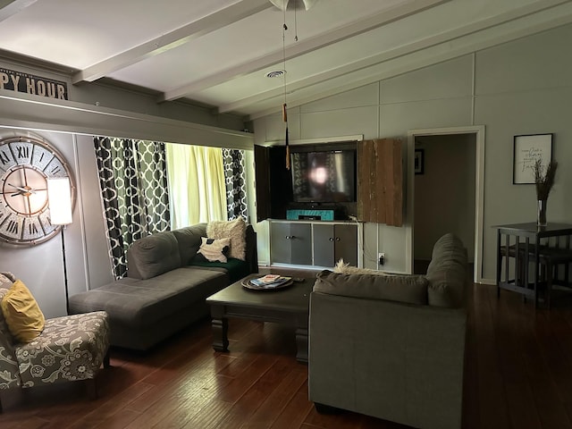 living room featuring dark wood-type flooring and lofted ceiling with beams