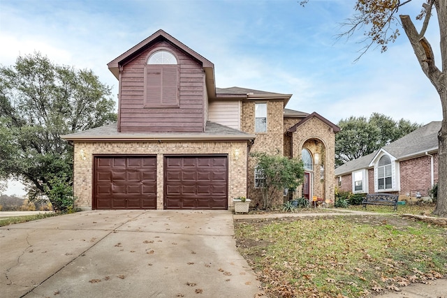 front of property featuring a garage