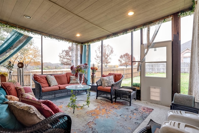 sunroom featuring wooden ceiling